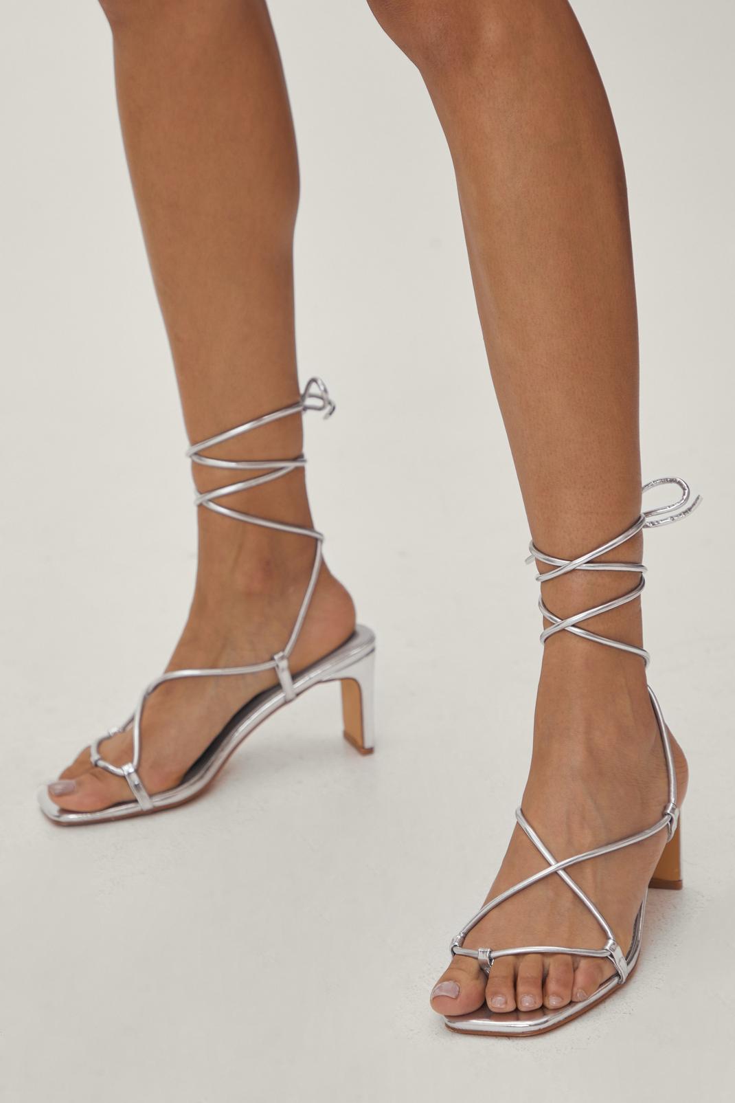 Strappy low clearance heels